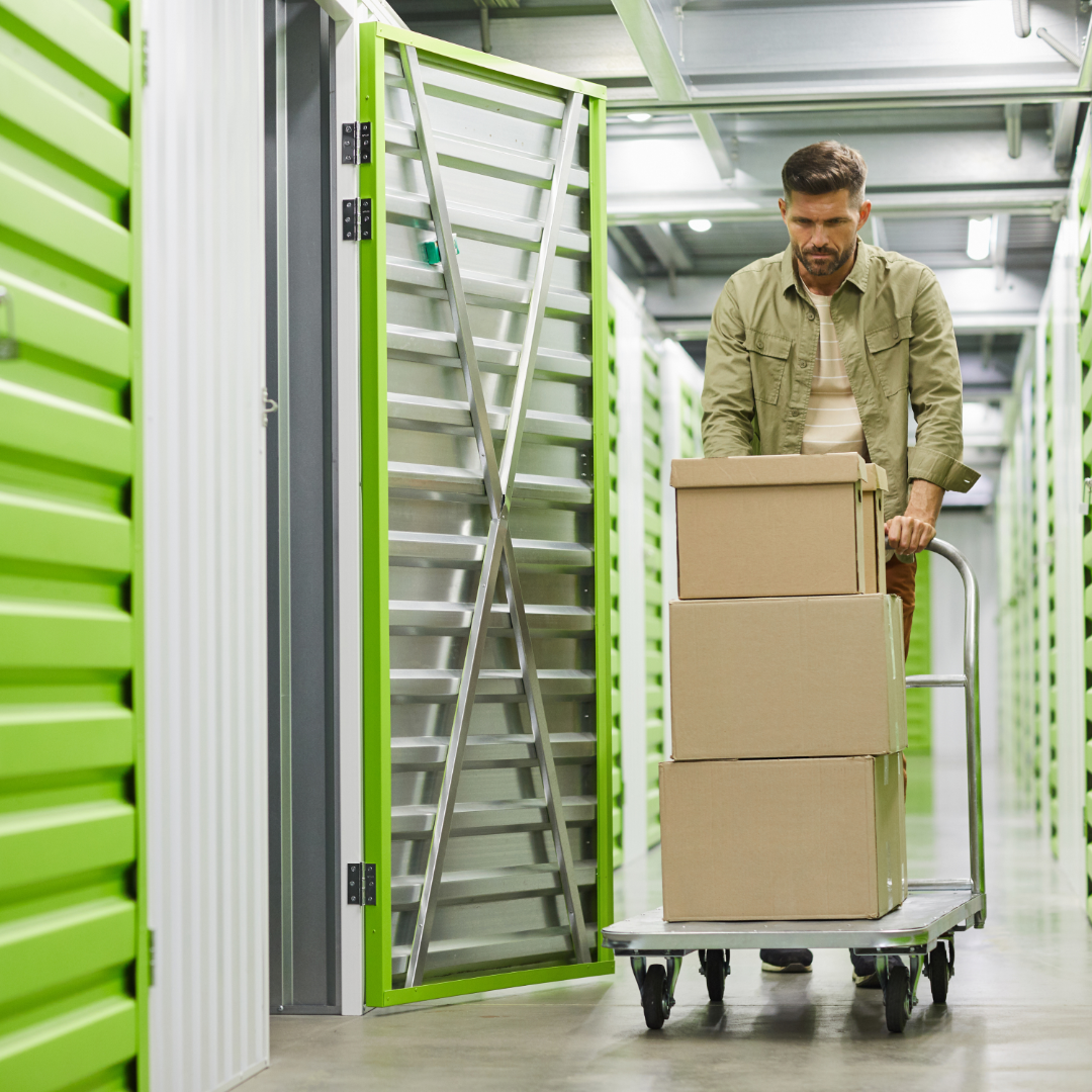 self storage corridor with green doors